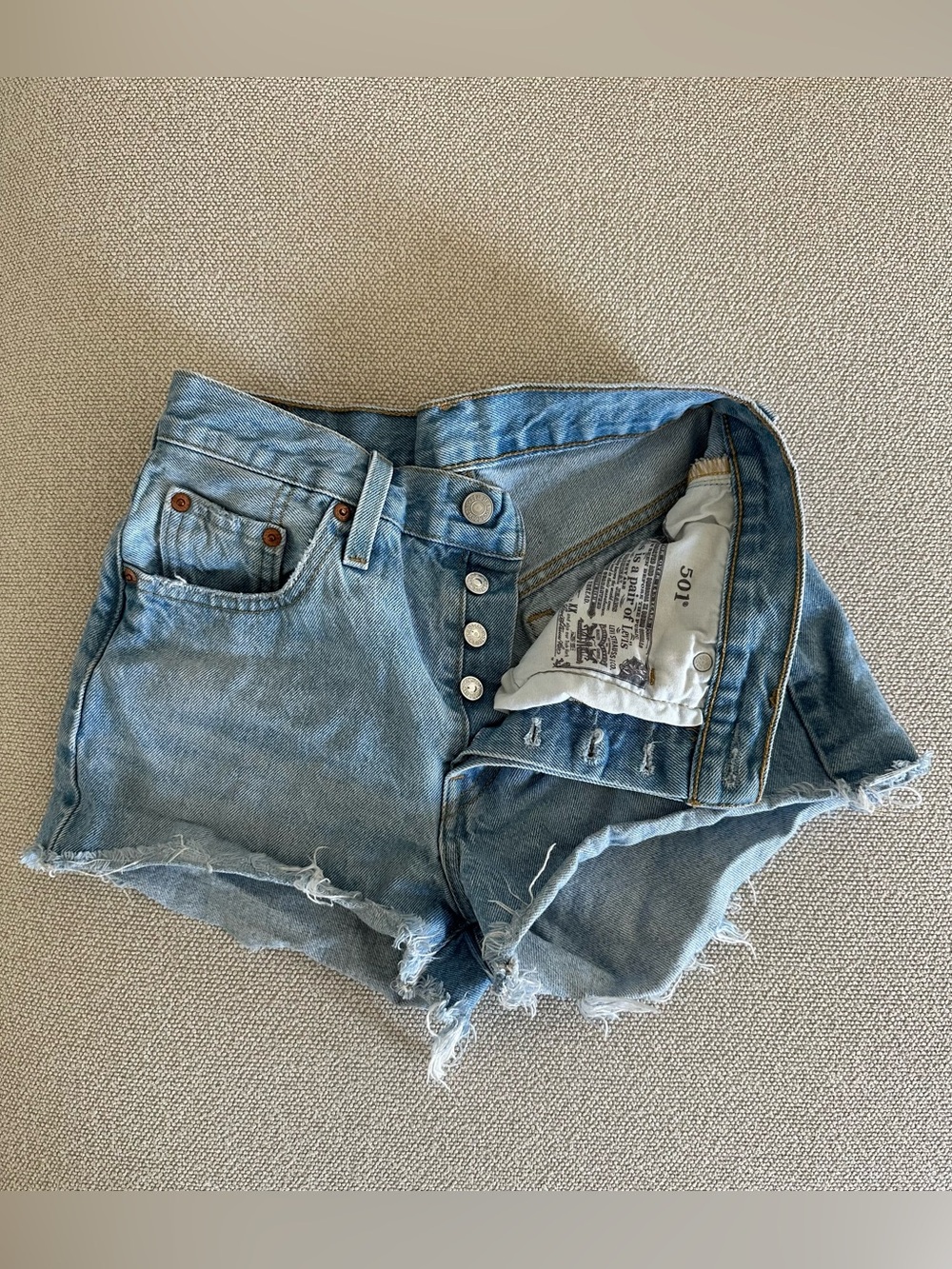 Levi's 501 Women’s Light Wash Blue Distressed Denim Cutoff Shorts